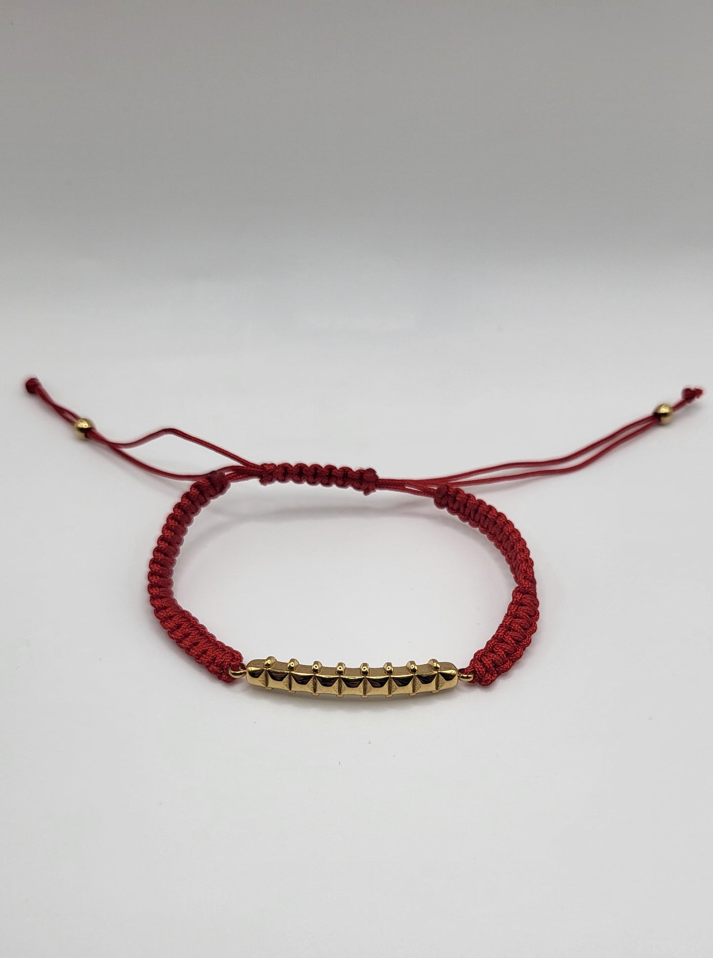 Bracelet fil rouge clash
